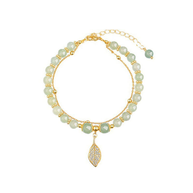 Bracelet perles chinoises et pendentif en forme de feuille
