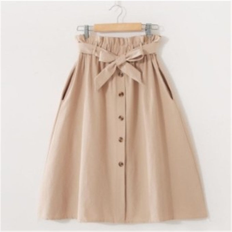 Jupe courte taille haute boutonnée avec ceinture