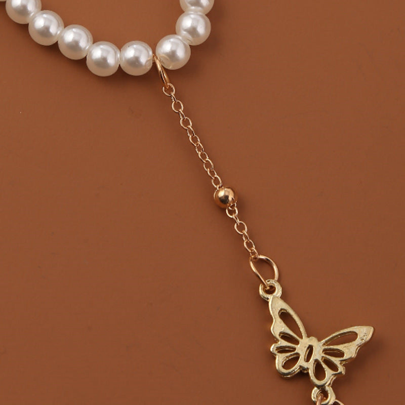 Bracelet en perle avec pendentif papillon - Chic&Shines
