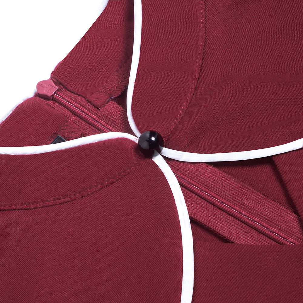 Robe courte rétro à col montant et coupe ajustée