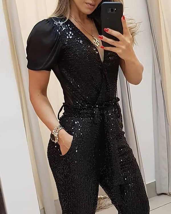 Combinaison pantalon à paillettes décolletée en V