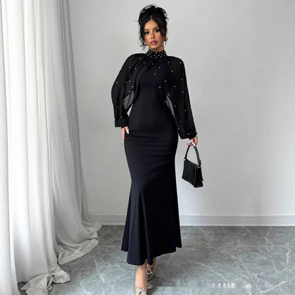 Robe longue moulante à manches bouffantes en dentelle