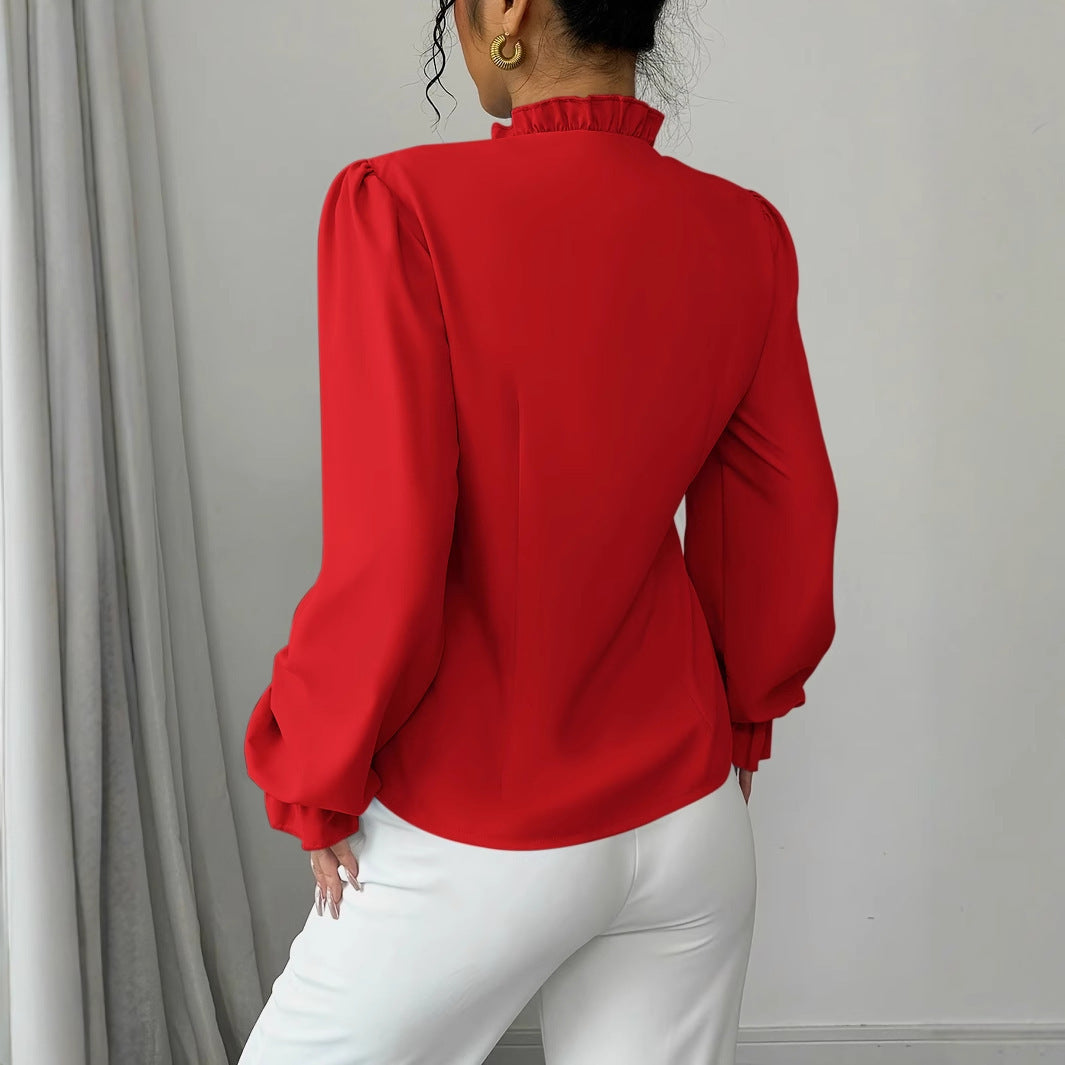 Chemisier élégant à manches longues et col boutonné asymétrique