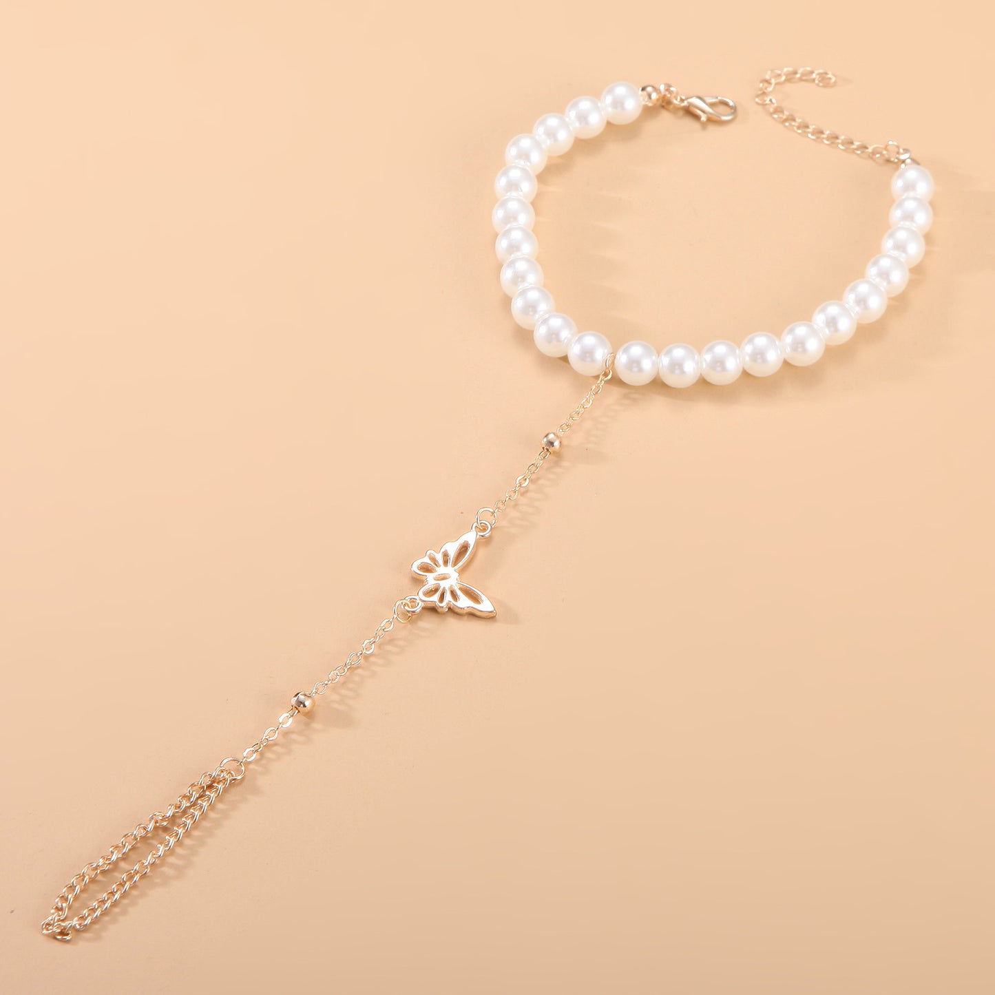 Bracelet en perle avec pendentif papillon - Chic&Shines