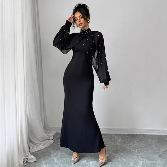 Robe longue moulante à manches bouffantes en dentelle