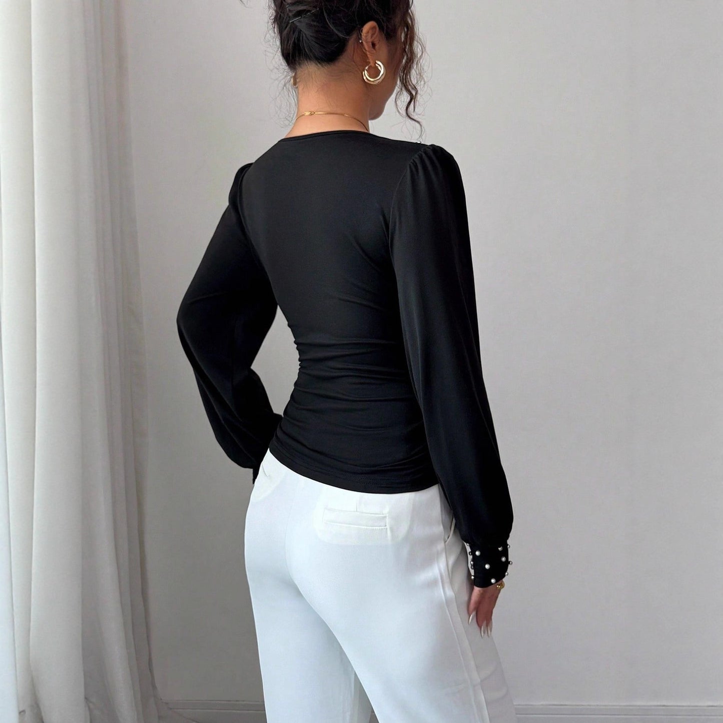 Haut à perle col V manches longues