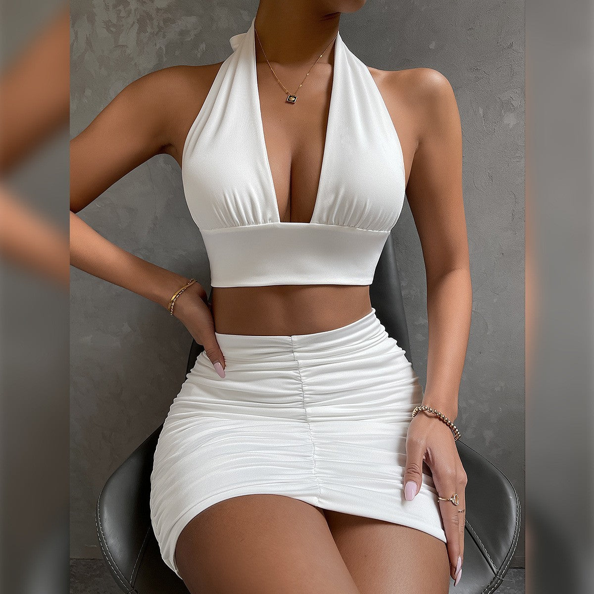 Ensemble 2 pièces haut licou et jupe courte plissée