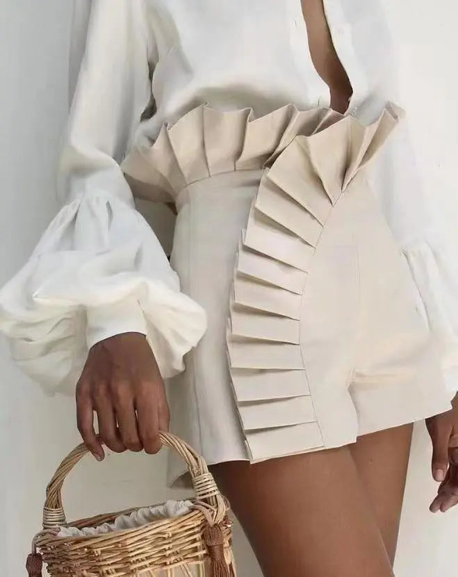 Short taille haute en dentelle plissée