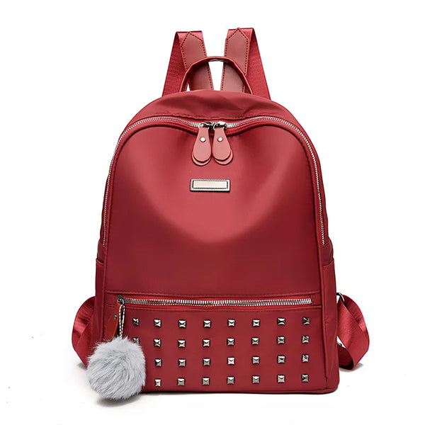 Mochila de piel encerada suave con remaches 