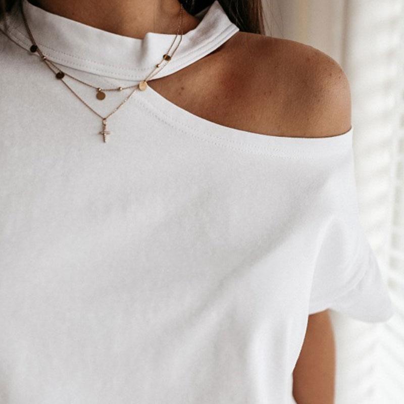 T-shirt à manches courtes et col rond creux de couleur unie