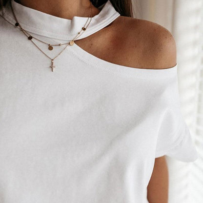 T-shirt à manches courtes et col rond creux de couleur unie